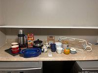 All items in lot on countertop