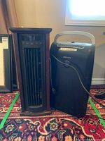 Space heater and dehumidifier side by side front view