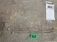 Both sterling silver chains laid flat showing overall length and clasps