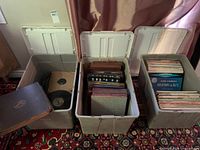 Three totes with records: LPs, bound albums, loose 78s