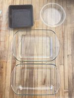 Group shot of rectangular casserole, round pie dish and square metal pan