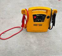 Front view of Bonaire Power Boost 1200 showing attached cables
