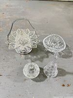 Group shot of all four pressed glass pieces