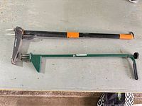 Top view of both weed pullers showing full length and design details