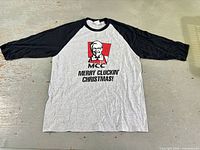 Full front view of shirt laid flat
