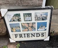 Front view of collage frame showing mat openings, FRIENDS text, protective wrap