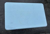 top view of light blue wooden kids table showing ring marks and wear