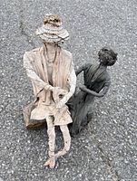 Both figurines together showing form and surface wear