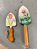 Front view of both painted trowels