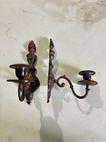 Both wall sconces front view