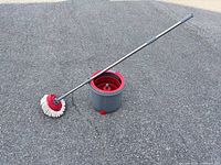 Spin mop assembled showing bucket, handle, mop head