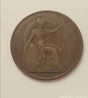Reverse with seated Britannia, denomination ONE PENNY, date 1916