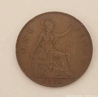 Reverse view showing Britannia, denomination and date