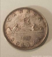Reverse side showing Voyageur design and 1937 date