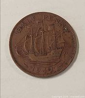 Reverse showing Golden Hind and date 1942