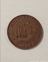 reverse side showing Golden Hind and date 1944