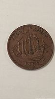 Reverse side showing Golden Hind and date 1957
