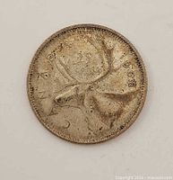 Reverse side with caribou and date 1968 visible