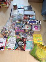 All items laid out showing kits, books, beads, stamps