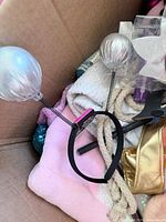 Box with headband, blankets, Olaf pieces visible