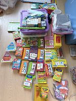 Flash card sets, triangular math games, chalk, stencils, recorder, storage tubs