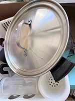 Stainless steel lid showing handle and brush finish