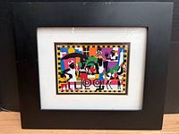 Front view of framed print with mat and frame