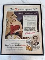 Front view of framed Camel advertisement print