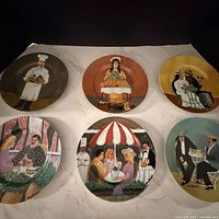 All six plates displayed to show overall set and individual designs