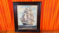 Full view of framed lithograph