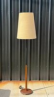 Full view of lamp showing shade, stem, column and base