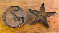 Top view of both copper molds showing shapes and patina