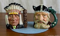 Front view of both character jugs