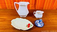 Front view of all four ceramic items