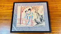Full view of framed Chinese watercolor painting on silk