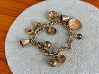 Overview of sterling charm bracelet with eight charms