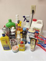 Group shot of all bottles, cans and containers displayed on table