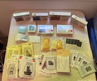 Overall view of all sealed miniature kits laid out on table