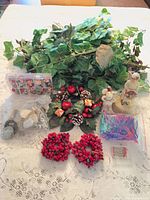 Group shot showing all items including garlands, picks, wreaths, figurines and craft pieces