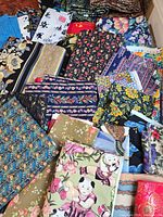 Overview of assorted fabric pieces showing variety of patterns and colours