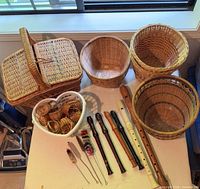 Group shot of all baskets, recorders and brushes on table