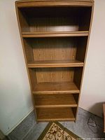 Front view showing full height and shelf configuration