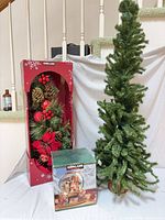 Tree standing upright, garland box, water globe box