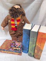 Group shot showing Hagrid plush, three hardcover books and two paperbacks