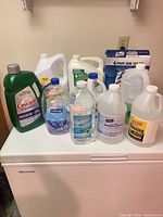Group view of all cleaning products on freezer top