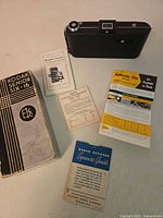 Camera back, manuals and inserts displayed