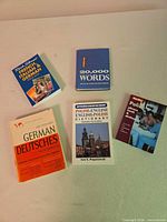 Front covers of five language reference books