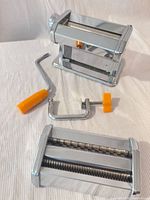 Pasta maker base, crank, clamp, extra cutter attachment