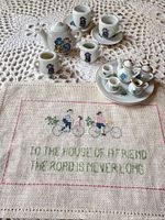 Full set displayed on crochet cloth showing all pieces