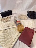Group shot showing all bags, pashmina and chain